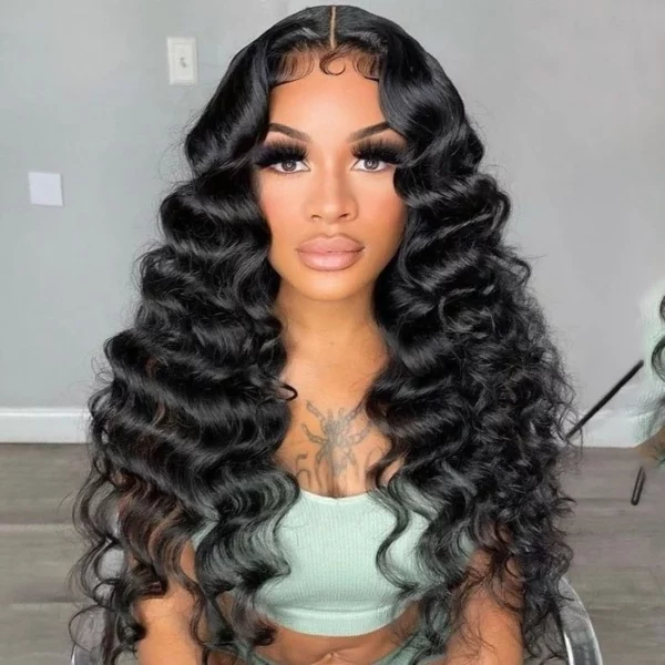 Caractéristique de la perruque sur la photo: Matière: virgin human hair Style: Loose deep Longueur: 28” Couleur: Naturelle – noir Lace: 13×4 Densité: 180%